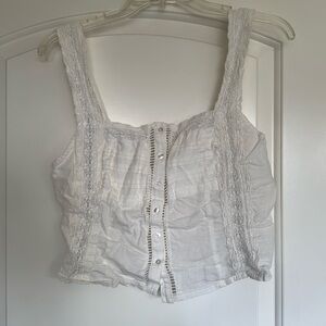 Free people top
Size L
Color White